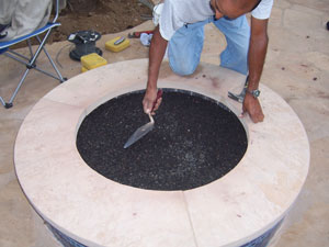 shaping fire lava rock in a fire pit