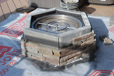stacker stone fire pit with metal fire ring